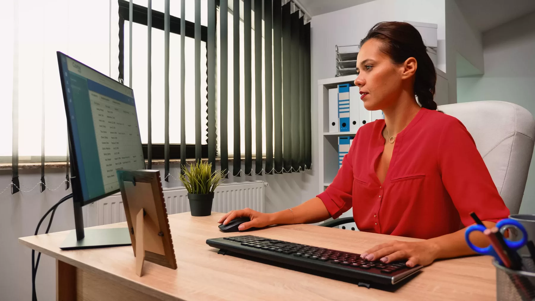 student sitting at a computer